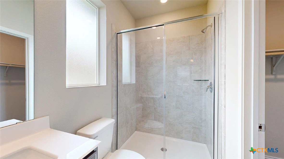 1111 Stone Vly Road Temple, TX 76502 - Photo 20 of 21 a bathroom with a shower and a toilet