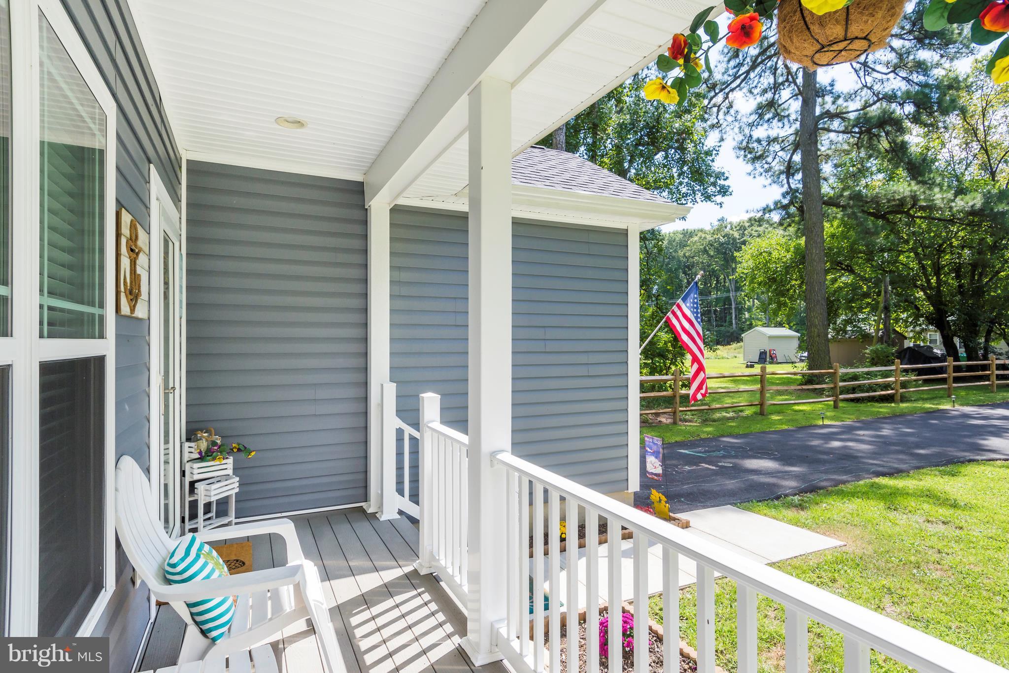 1133 Perrys Corner Road Grasonville, MD 21638 - Photo 4 of 30 Sit back and relax on this inviting front porch!