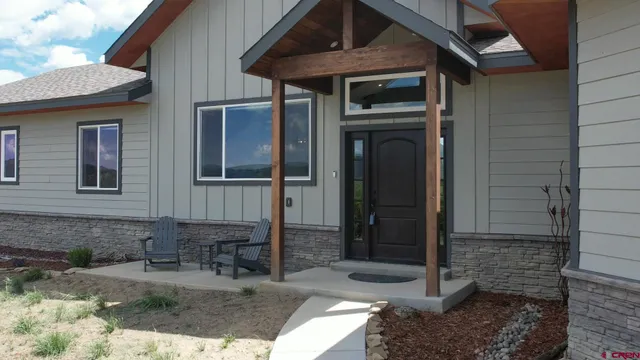 a view of a balcony with lake view and mountain view
