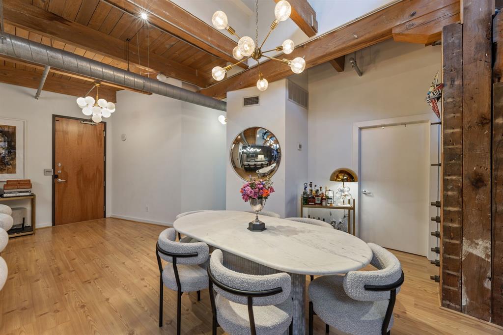 509 Elm Street, Unit 601 Dallas, TX 75202 - Photo 17 of 37 a view of a dining room with furniture