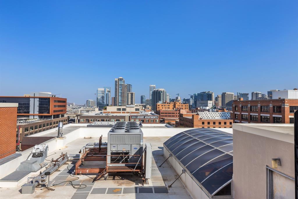 509 Elm Street, Unit 601 Dallas, TX 75202 - Photo 36 of 37 a view of a terrace with sitting area