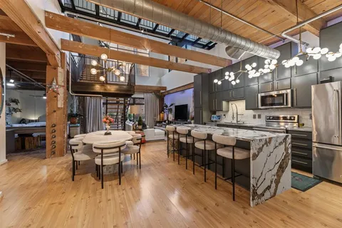 a group of people sitting in living room