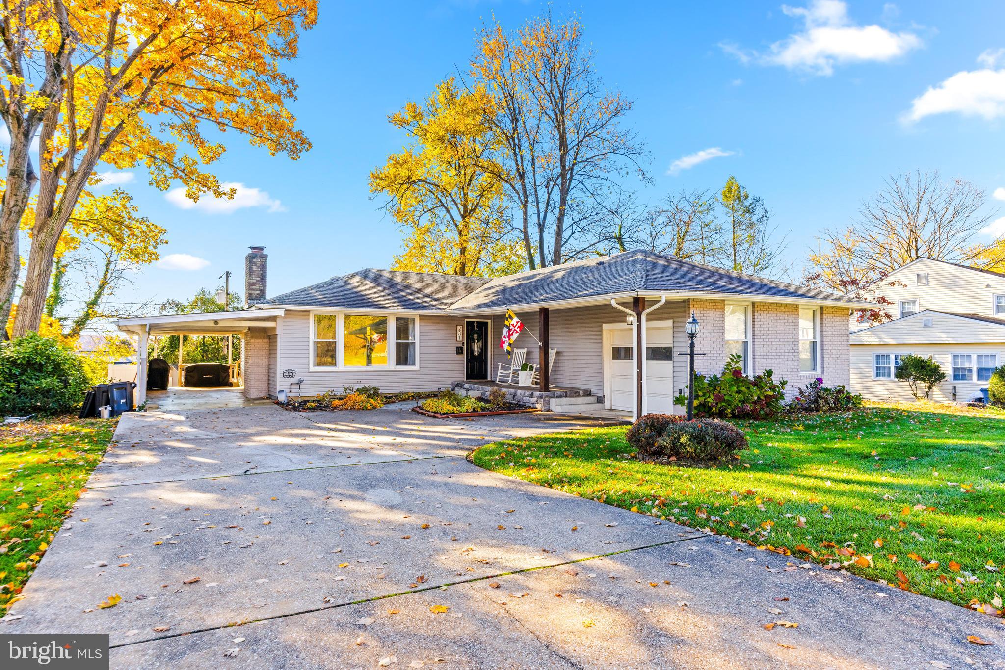 231 East Timonium Road Lutherville-Timonium, MD 21093 - Photo 2 of 66 a front view of a house with garden
