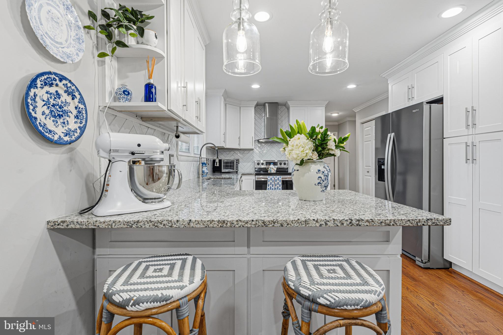 231 East Timonium Road Lutherville-Timonium, MD 21093 - Photo 24 of 66 a view of a kitchen with granite countertop a table and chairs