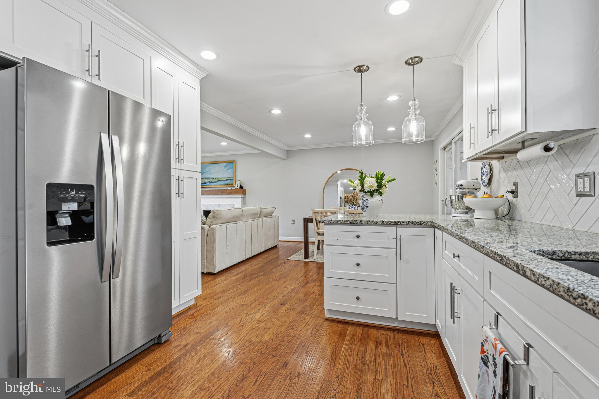 231 East Timonium Road Lutherville-Timonium, MD 21093 - Photo 27 of 66 a kitchen with white cabinets and stainless steel appliances