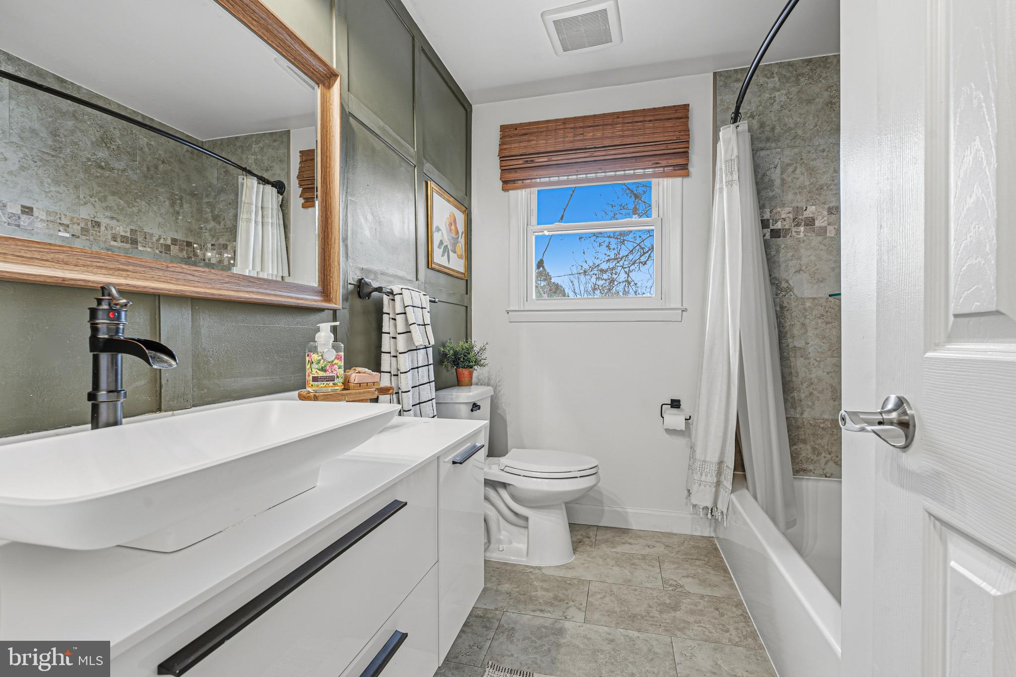 231 East Timonium Road Lutherville-Timonium, MD 21093 - Photo 34 of 66 a bathroom with a sink a toilet and shower