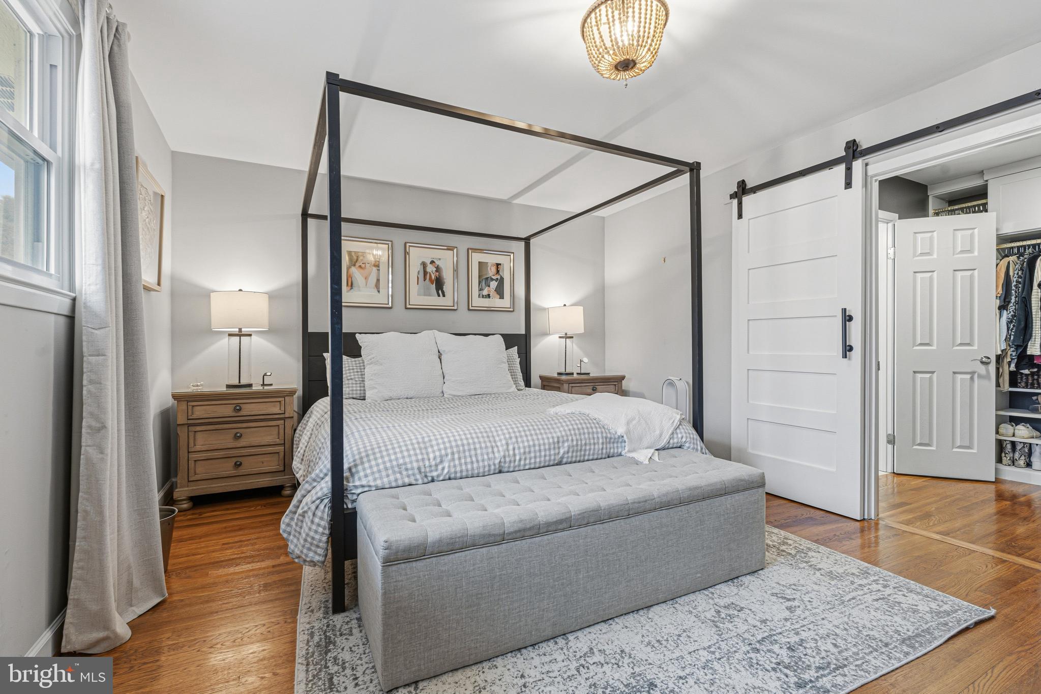 231 East Timonium Road Lutherville-Timonium, MD 21093 - Photo 38 of 66 a bedroom with a bed and a mirror