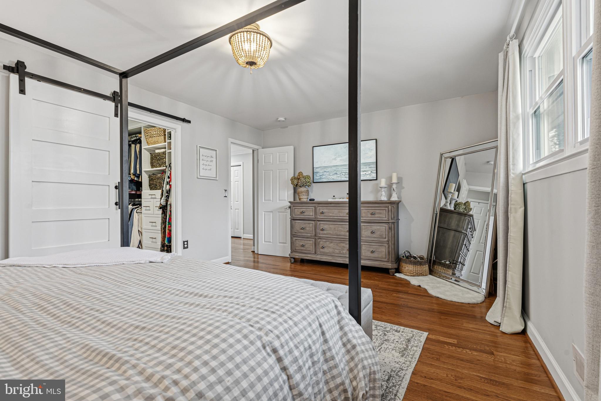 231 East Timonium Road Lutherville-Timonium, MD 21093 - Photo 39 of 66 a bedroom with a bed and a walk in closet