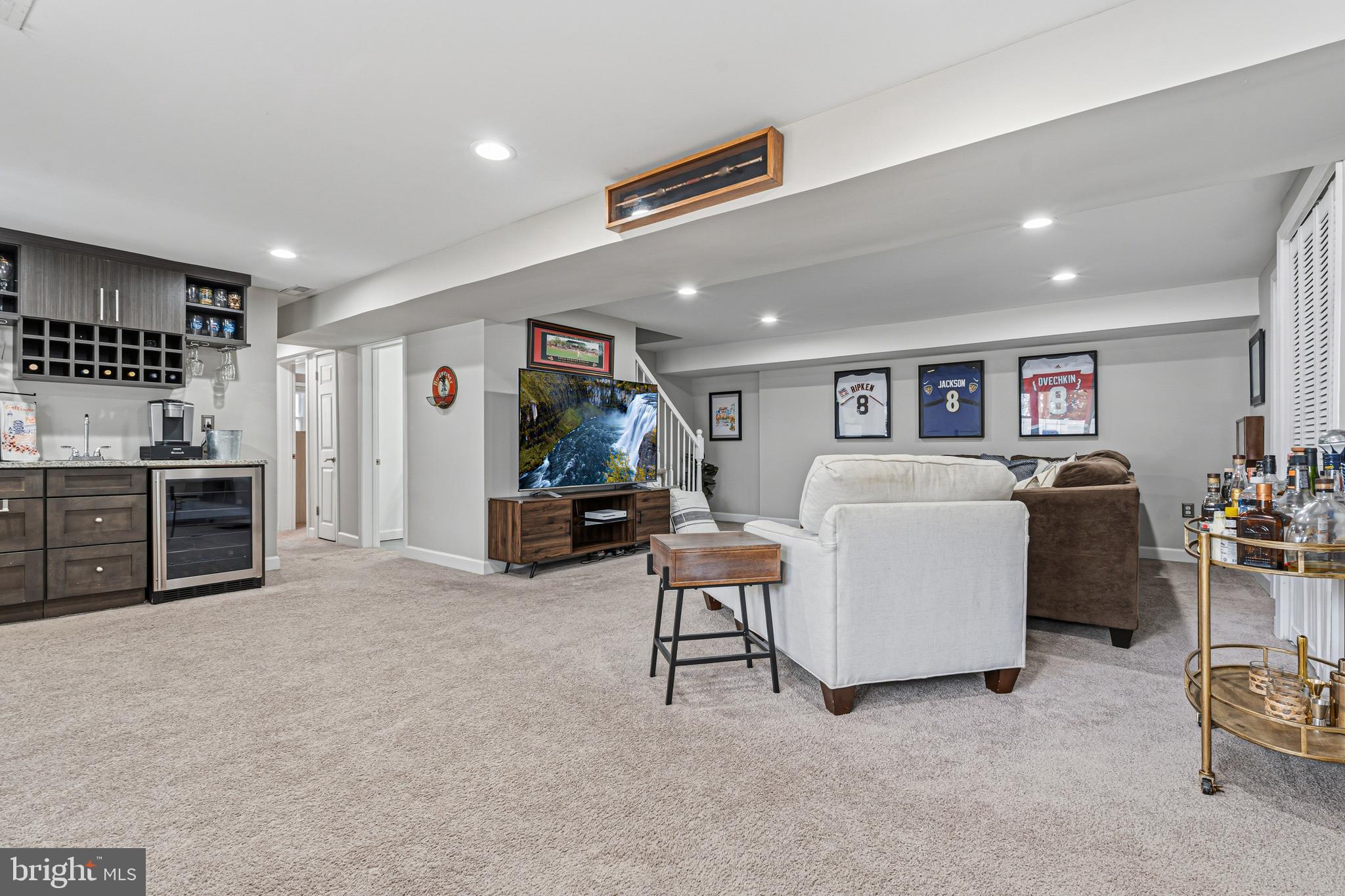 231 East Timonium Road Lutherville-Timonium, MD 21093 - Photo 43 of 66 a living room with furniture and a flat screen tv
