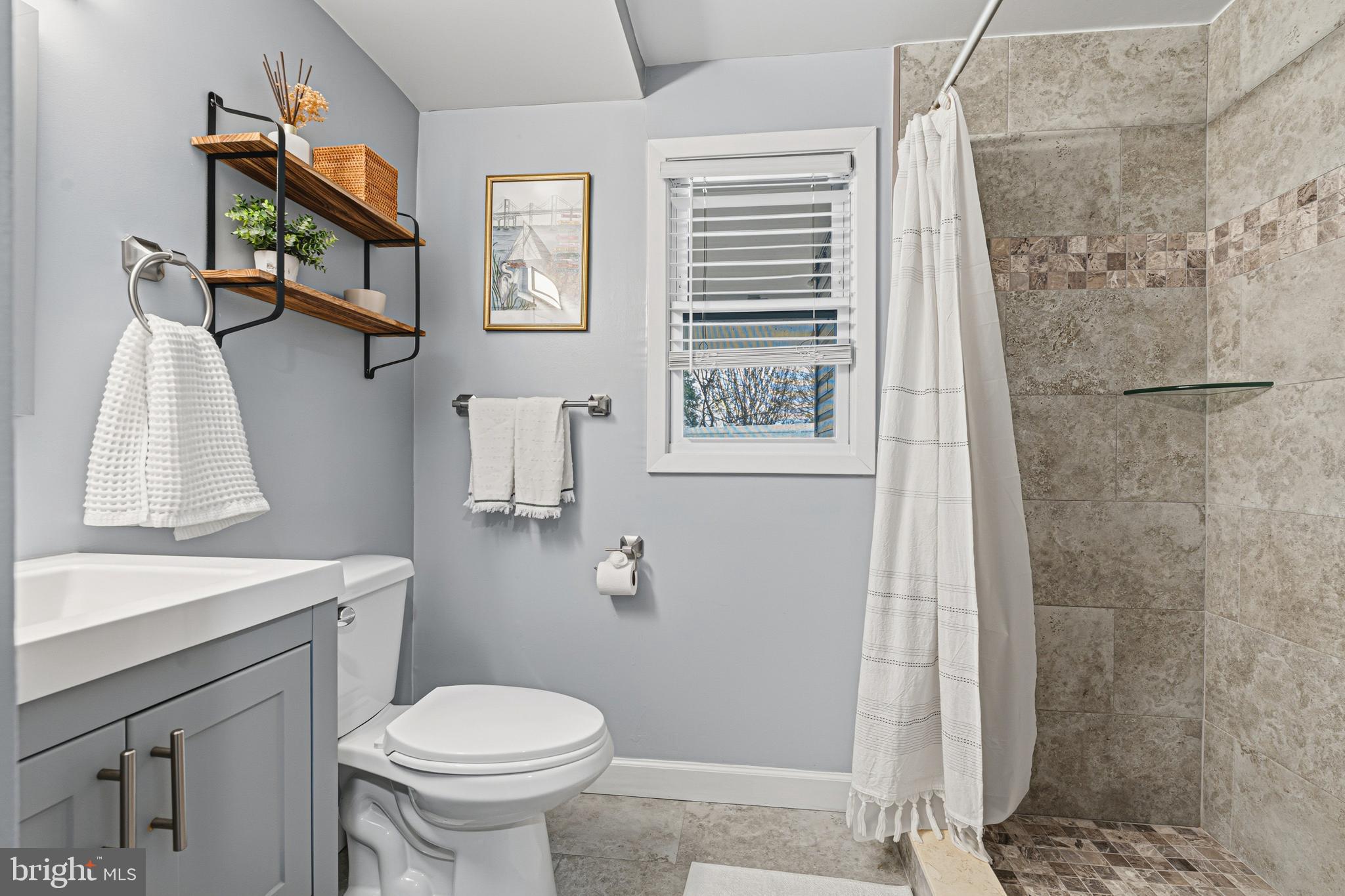 231 East Timonium Road Lutherville-Timonium, MD 21093 - Photo 47 of 66 a bathroom with a sink toilet and shower