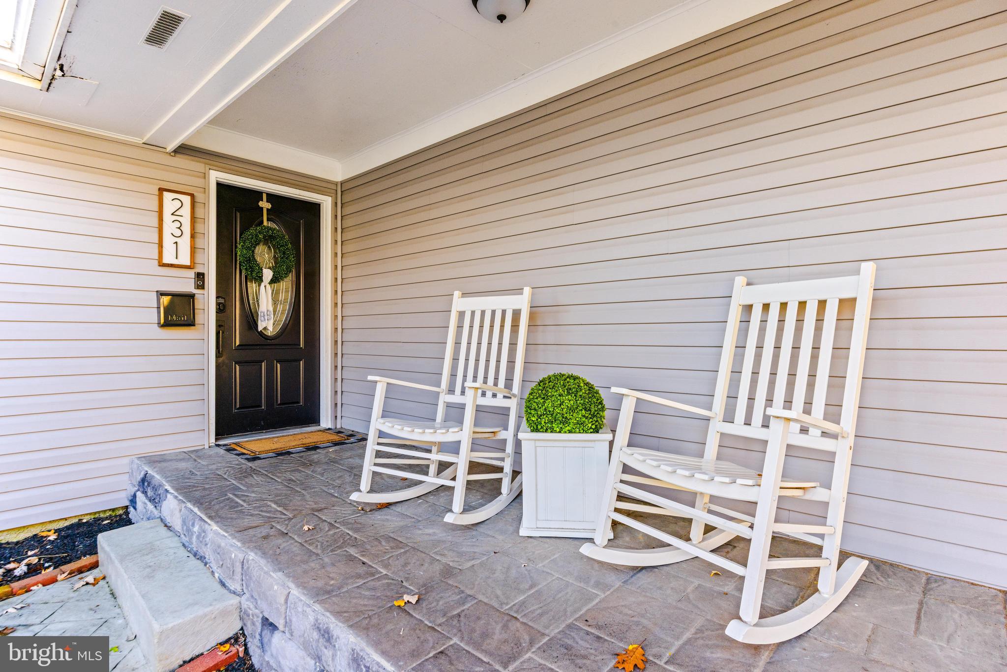 231 East Timonium Road Lutherville-Timonium, MD 21093 - Photo 7 of 66 a view of a two chairs in the balcony