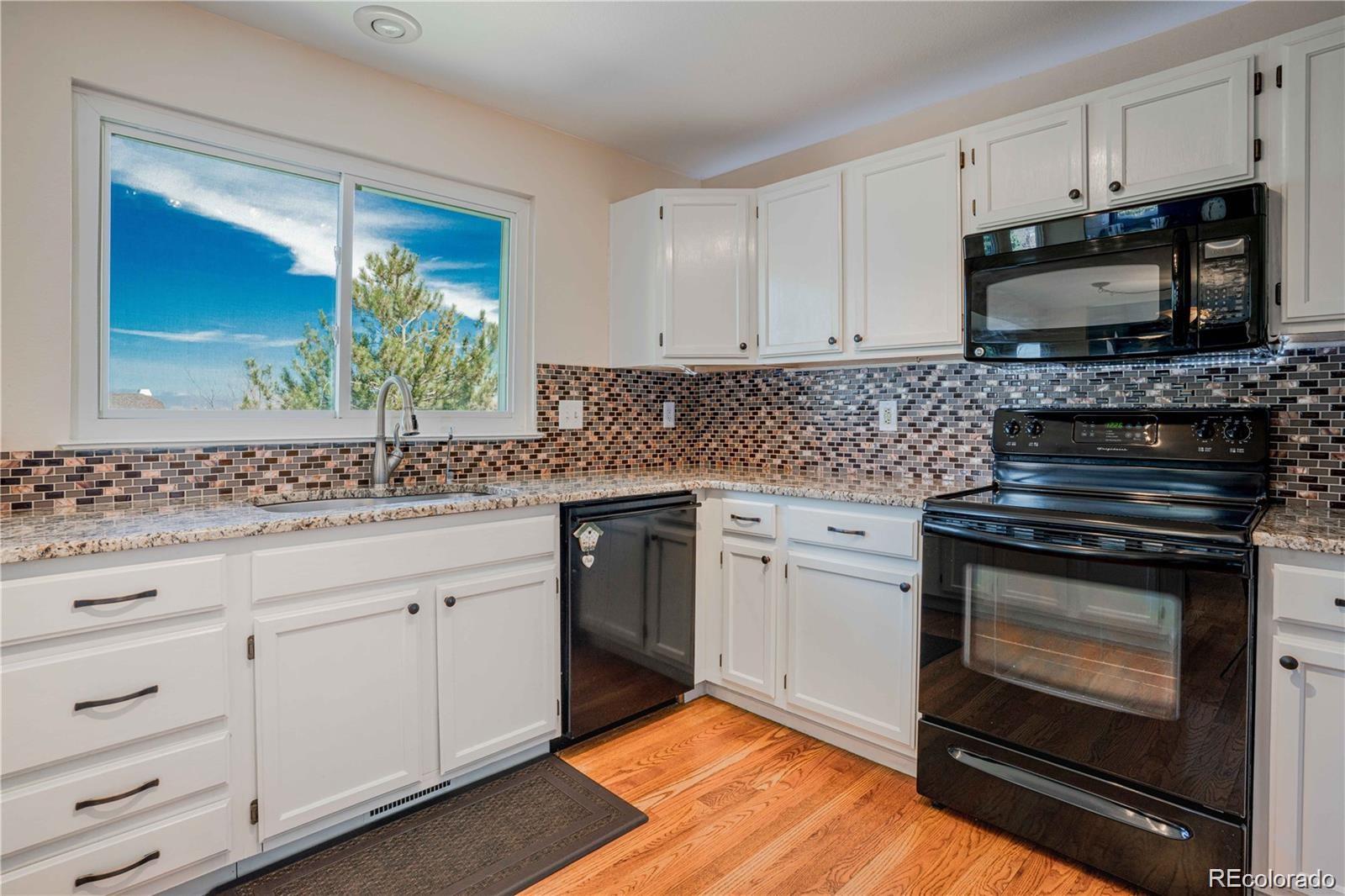 807 Poppywood Place Highlands Ranch, CO 80126 - Photo 9 of 33