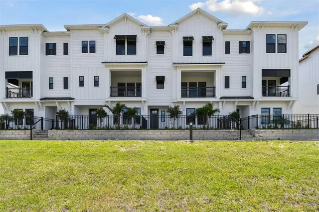 a view of house with swimming pool