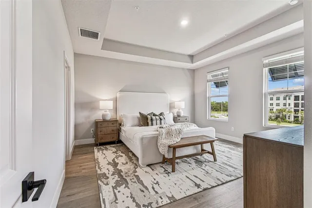 a bedroom with a bed and a dresser