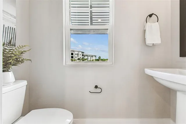 a outdoor living space with furniture and a potted plant