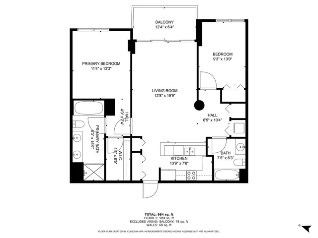 a picture of a bench in front of a wall