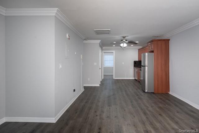 311 West Main Street, Unit 12 Patchogue, NY 11772 - Photo 5 of 8 a view of a hallway with wooden floor