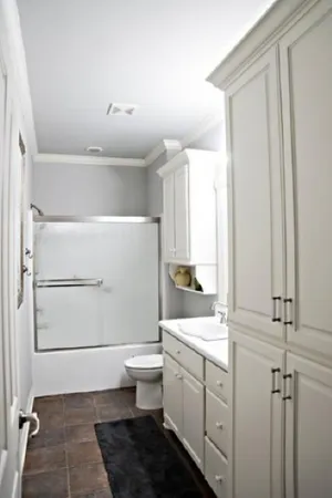 a kitchen with appliances cabinets and a sink