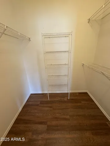 a view of an empty walk in closet