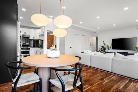 a kitchen with a table and chairs