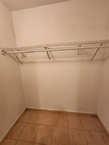 a view of a room with racks on the wall