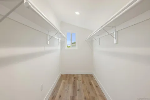 a view of a room with racks on the wall