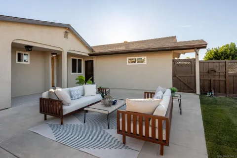 a outdoor living space with furniture and a couch