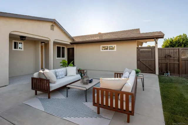a outdoor living space with furniture and a couch