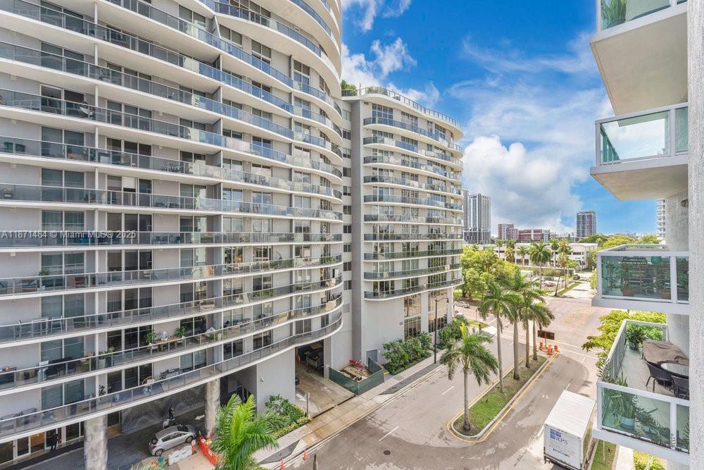 1800 North Bayshore Drive, Unit 614 Miami, FL 33132 - Photo 21 of 29 a city view with tall buildings and a bench