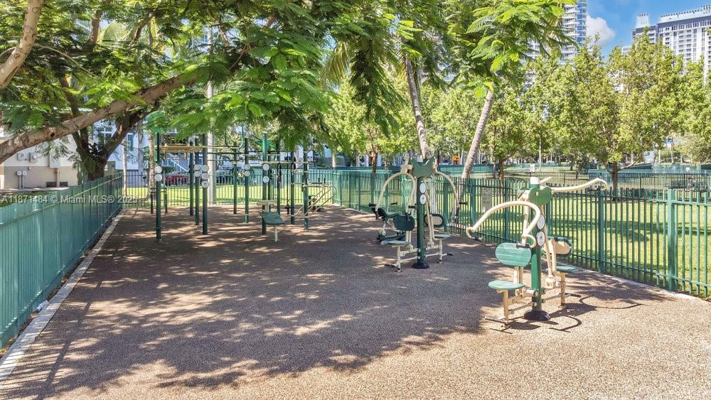 1800 North Bayshore Drive, Unit 614 Miami, FL 33132 - Photo 24 of 29 a view of a lake with a yard