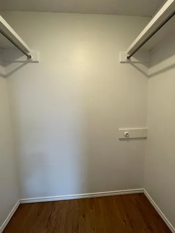 a view of a room with racks on the wall