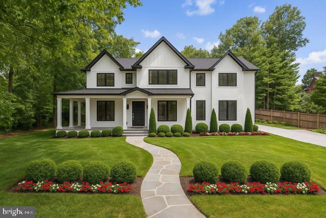 11313 Marcliff Road North Bethesda, MD 20852 - Photo 19 of 22 a front view of a house with a yard