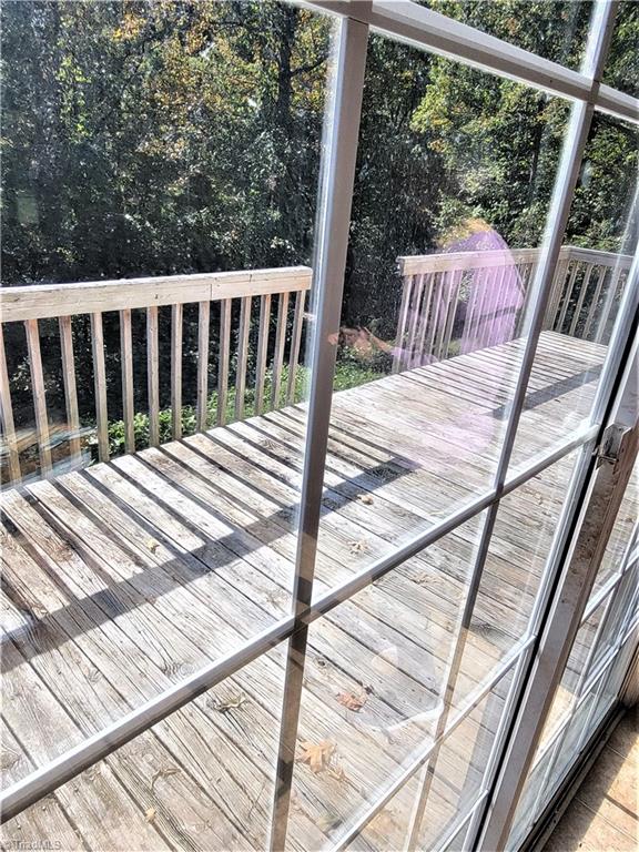 605 Tall Tree Road Clemmons, NC 27012 - Photo 12 of 21 Deck accessible by sliding door in dining OR laundry room