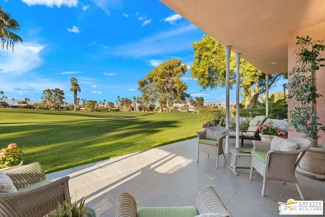 a living room with furniture fireplace and a flat screen tv