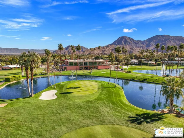 a bedroom with double bed and a window
