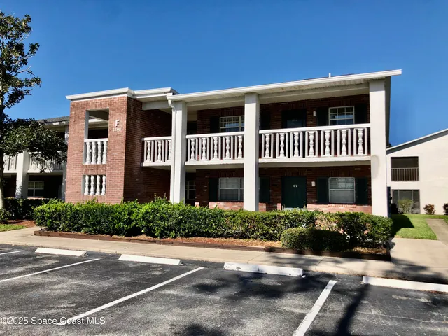 a view of a swimming pool with a terrace