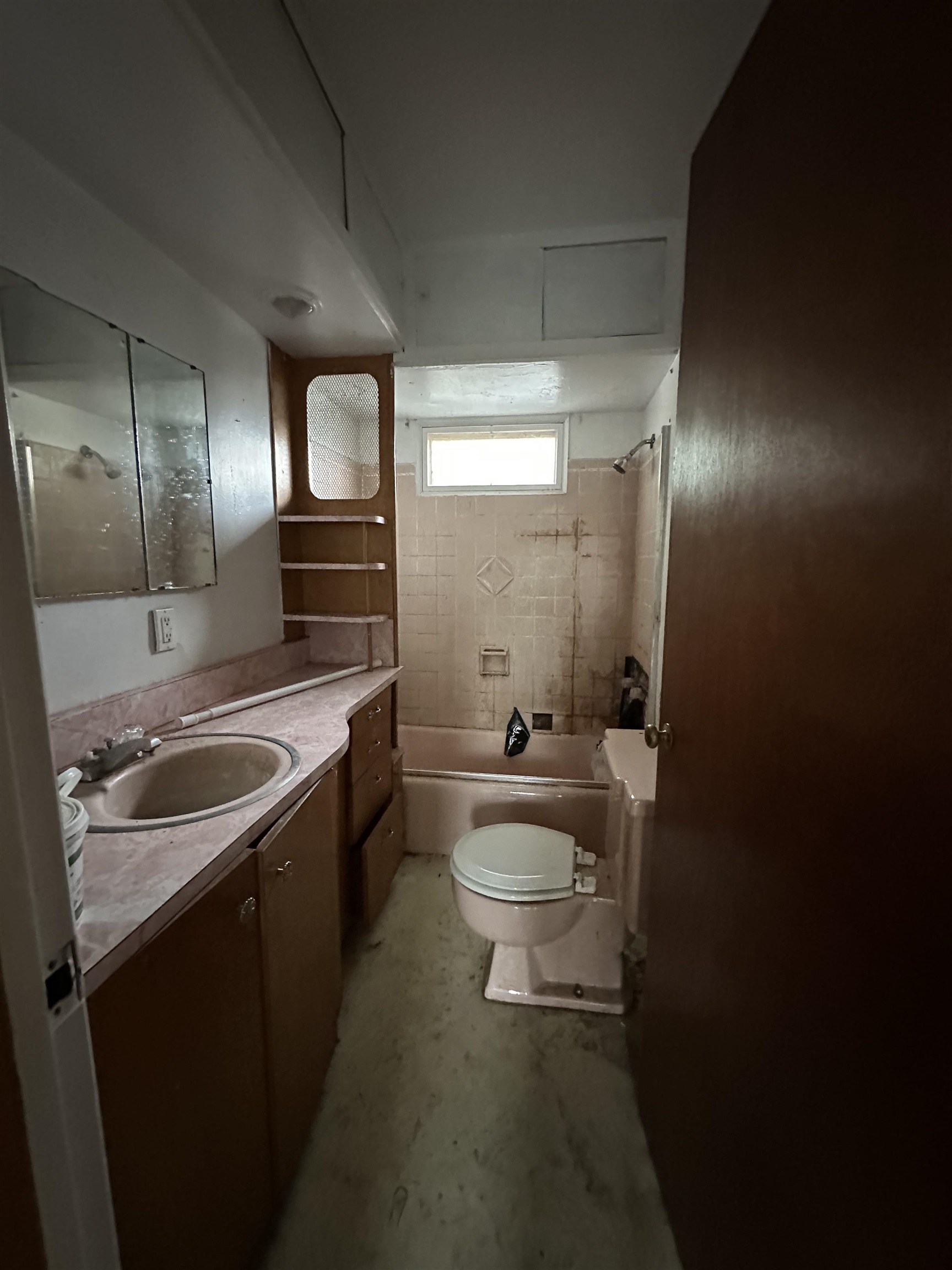 131 3rd Street Savanna, IL 61074 - Photo 12 of 16 a bathroom with a sink toilet and shower