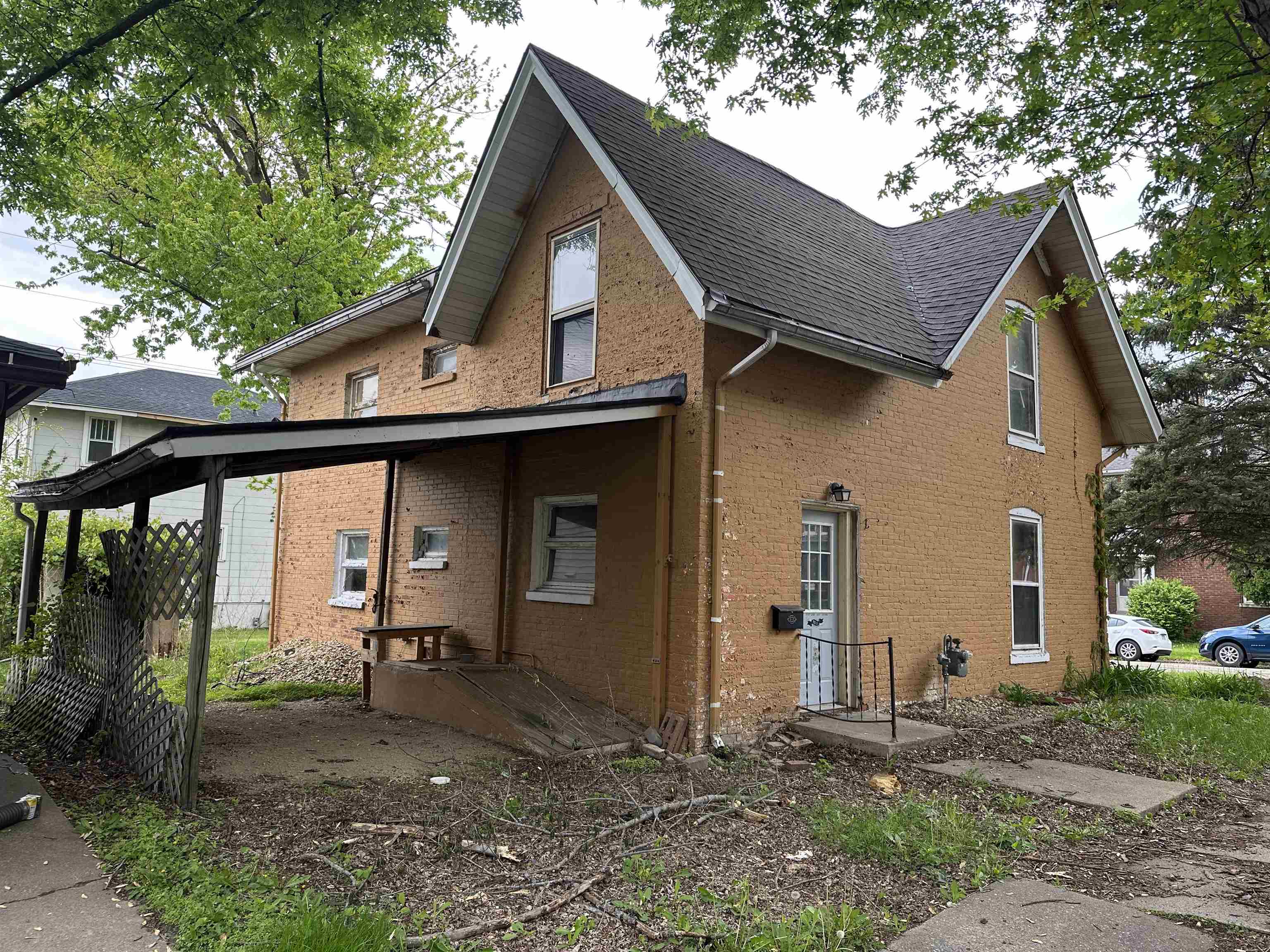 131 3rd Street Savanna, IL 61074 - Photo 2 of 16 a view of a house with a yard