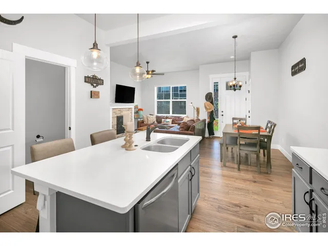 a kitchen with a table and chairs