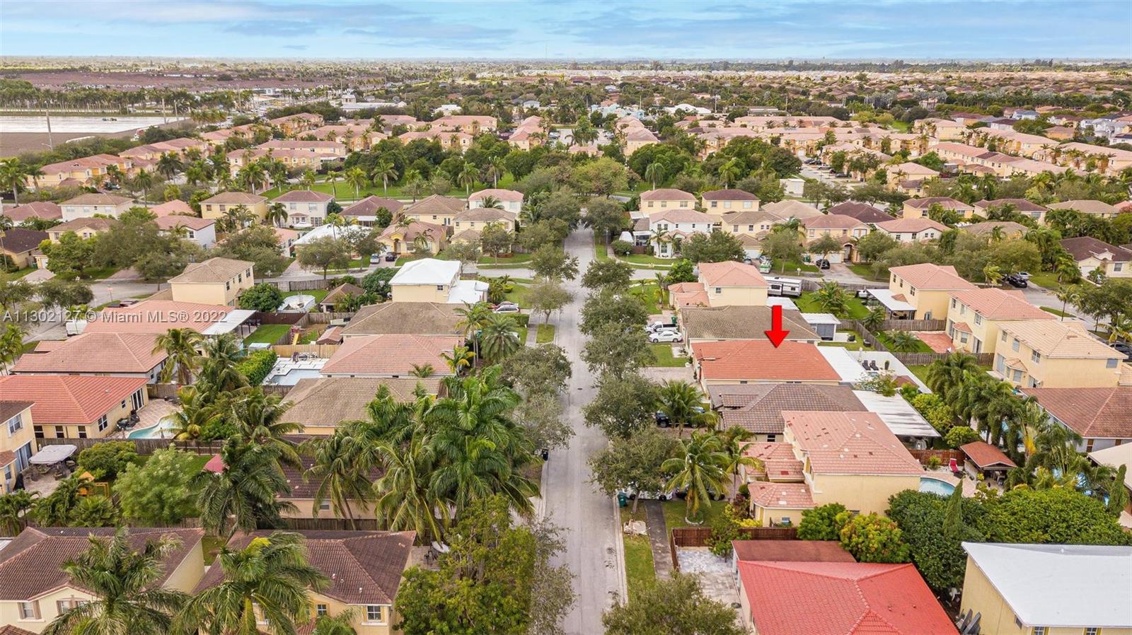 10837 Southwest 246th Street Homestead, FL 33032 - Photo 37 of 44 an aerial view of residential houses with outdoor space