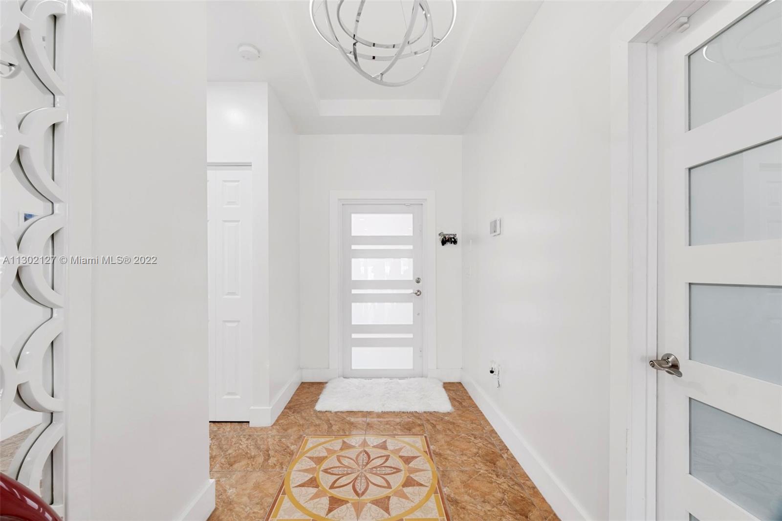 10837 Southwest 246th Street Homestead, FL 33032 - Photo 4 of 44 a view of a hallway with closet