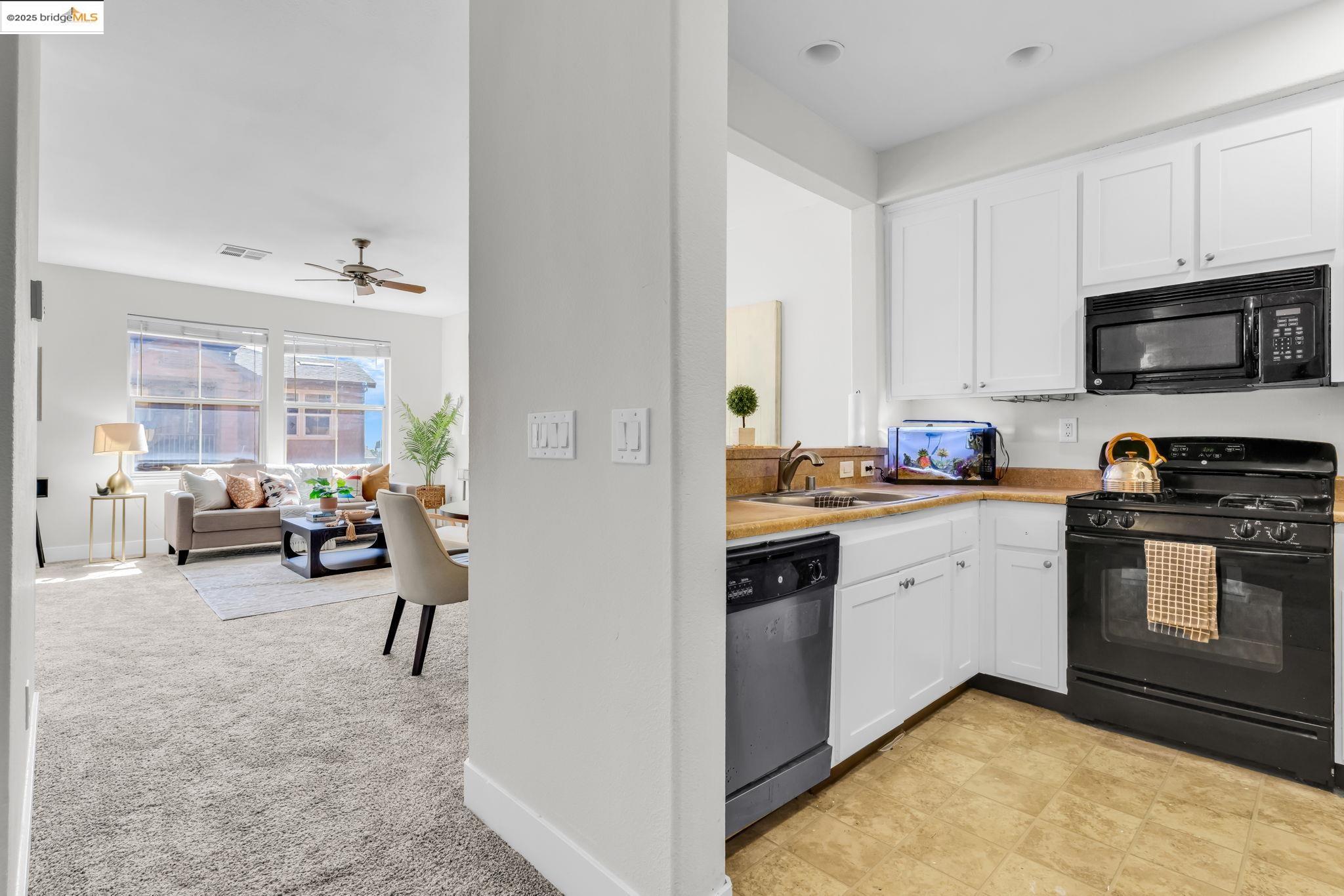 6063 Old Quarry Loop Oakland, CA 94605 - Photo 36 of 36 a open kitchen with sink cabinets and appliances