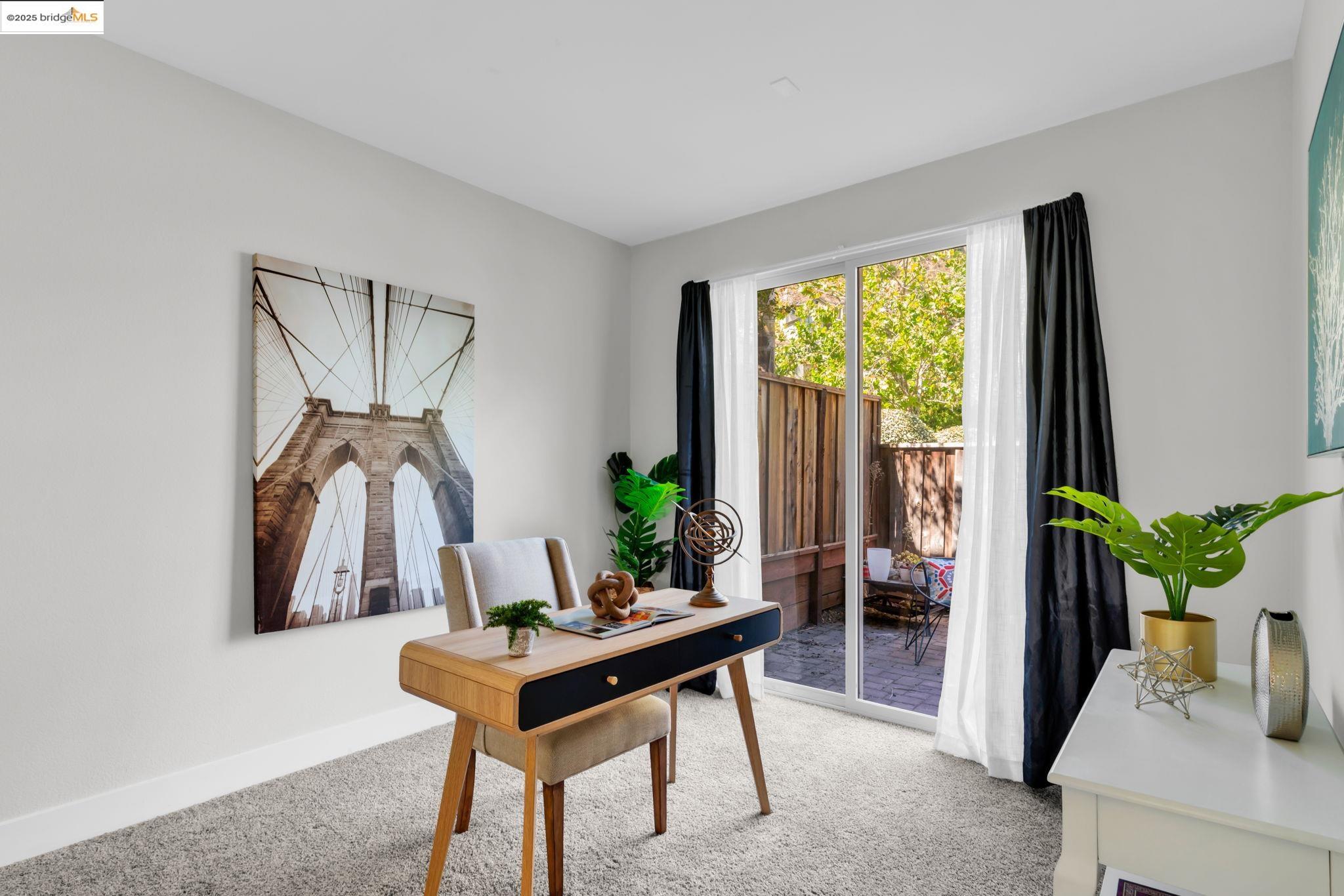 6063 Old Quarry Loop Oakland, CA 94605 - Photo 15 of 36 a living room with furniture and a potted plant