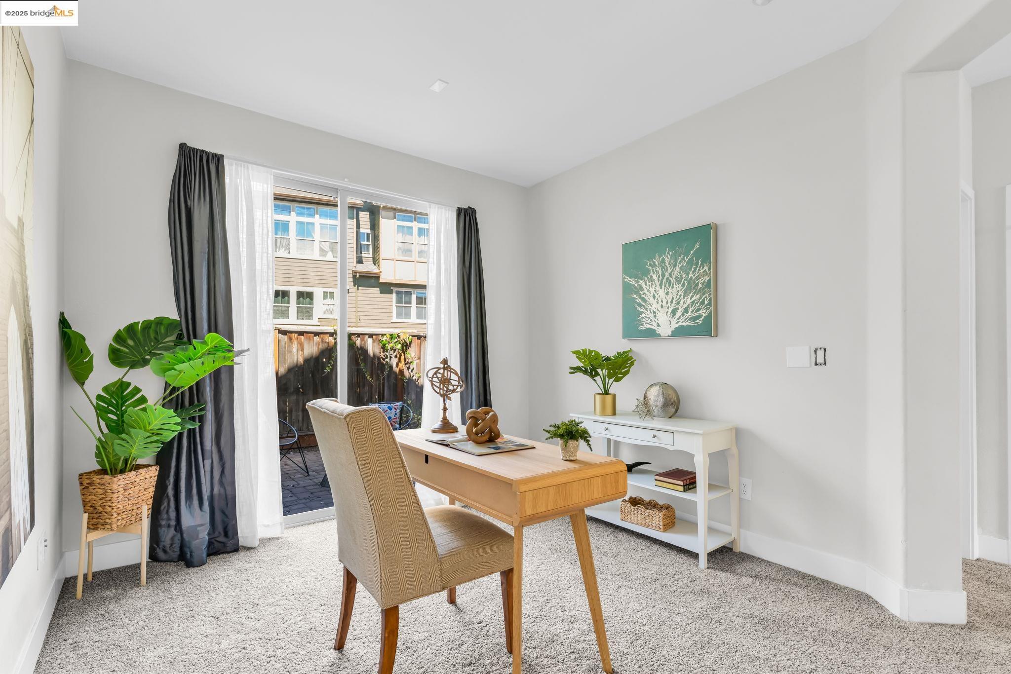 6063 Old Quarry Loop Oakland, CA 94605 - Photo 16 of 36 a dining room with furniture and a potted plant