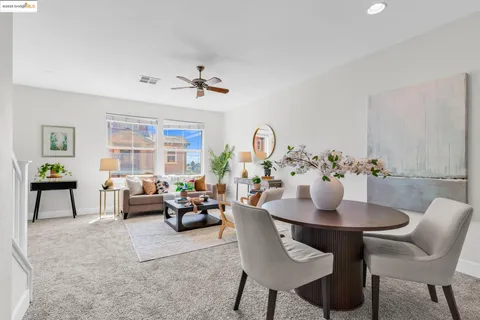 a view of a dining room with furniture