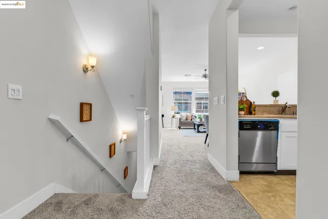 a view of a living room with furniture