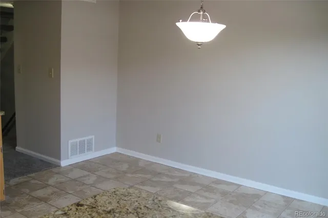 a bathroom with a light fixture