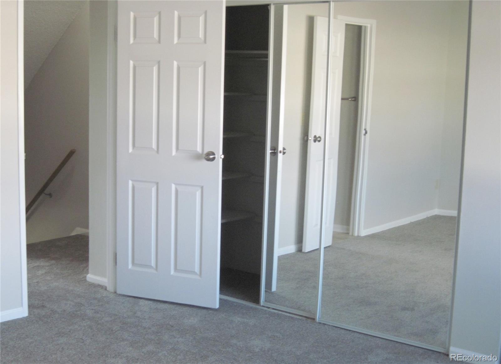 258 West Rockrimmon Boulevard, Unit F Colorado Springs, CO 80919 - Photo 18 of 41 an empty room with windows