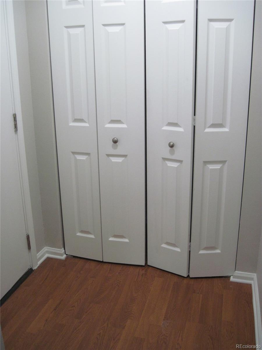 258 West Rockrimmon Boulevard, Unit F Colorado Springs, CO 80919 - Photo 2 of 41 an empty room with closet area