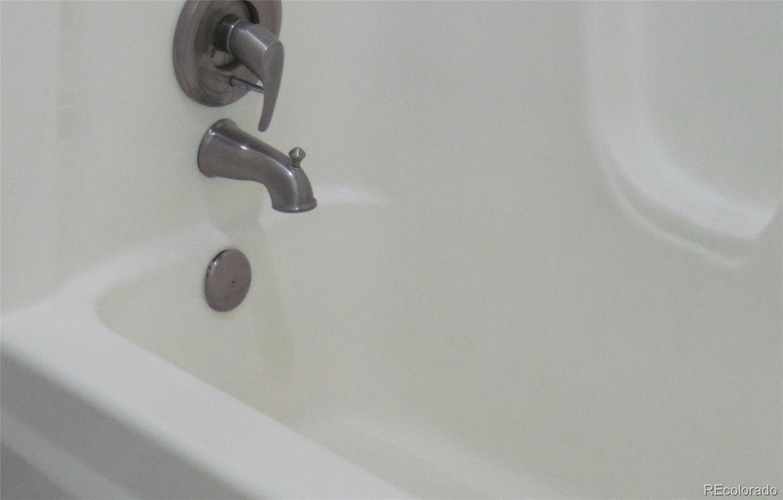 258 West Rockrimmon Boulevard, Unit F Colorado Springs, CO 80919 - Photo 23 of 41 a bathroom with a shower